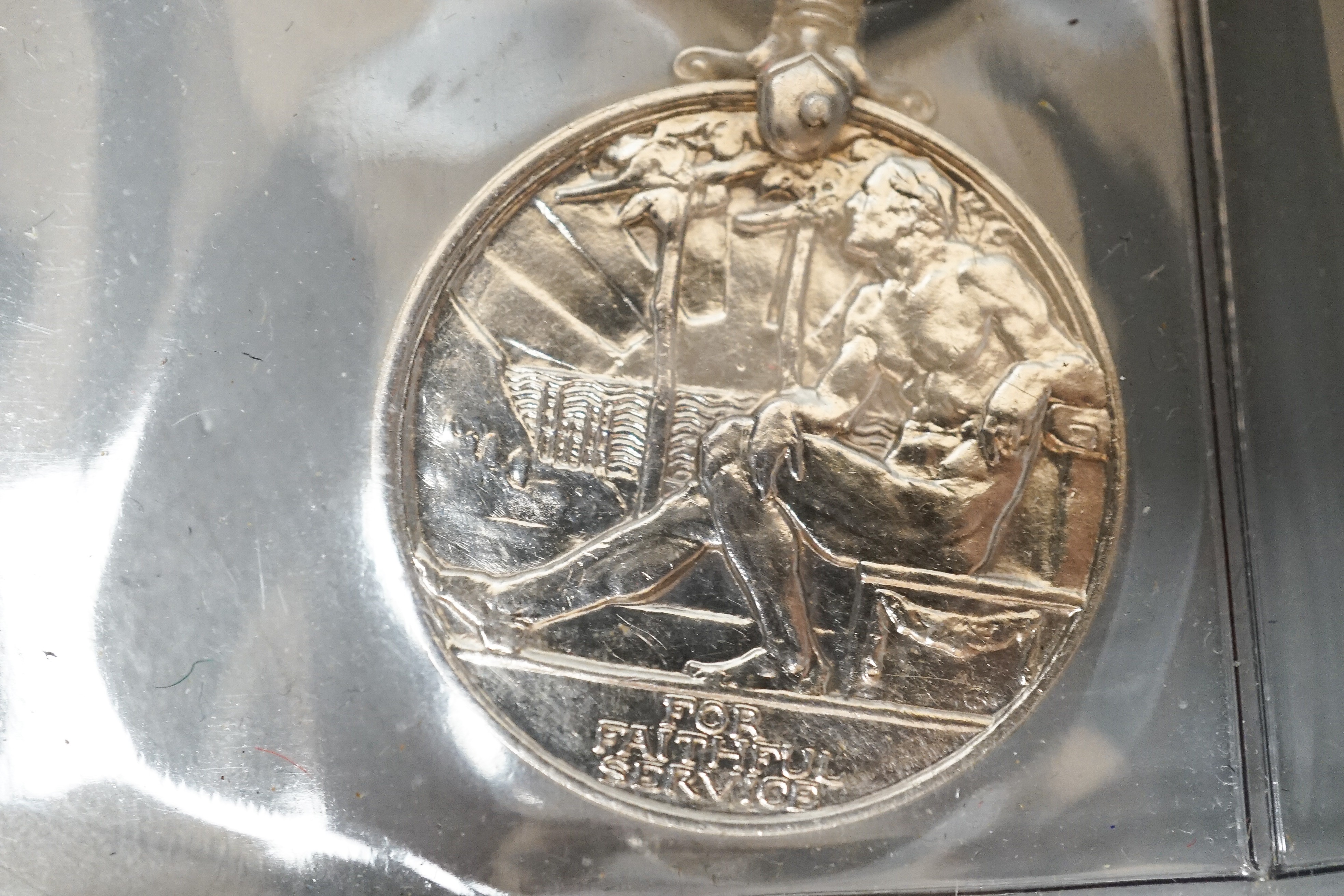 Three Imperial Service medals to Edward James Parker, William Horsfield and Albert Edward Ellis and two Service medals of the Order of St John to 13472 A/SIS.M.TIDMAN.BRISTOL.NO.1.NSG.DIV.NO.2DIS.JAB. 1935 and E692 SGT.